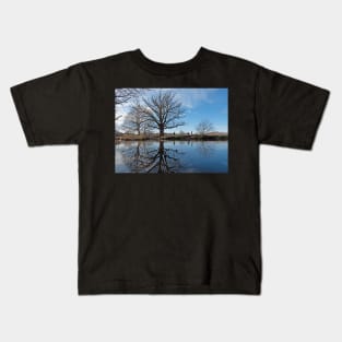 Reflections of trees in water Kids T-Shirt